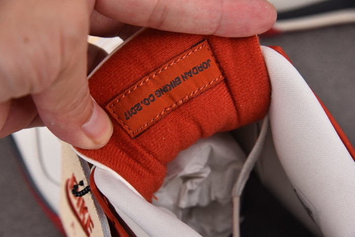 Nigel Sylvester x Air Jordan 4 Sail/Cinnabar-Black IQ8055-100